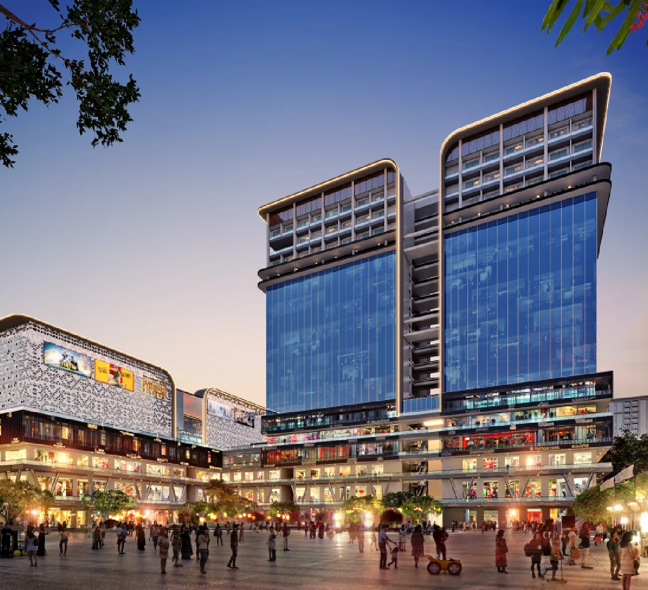 Modern commercial property in Greater Noida featuring retail shops, office spaces, and studio apartments with glass façade architecture.