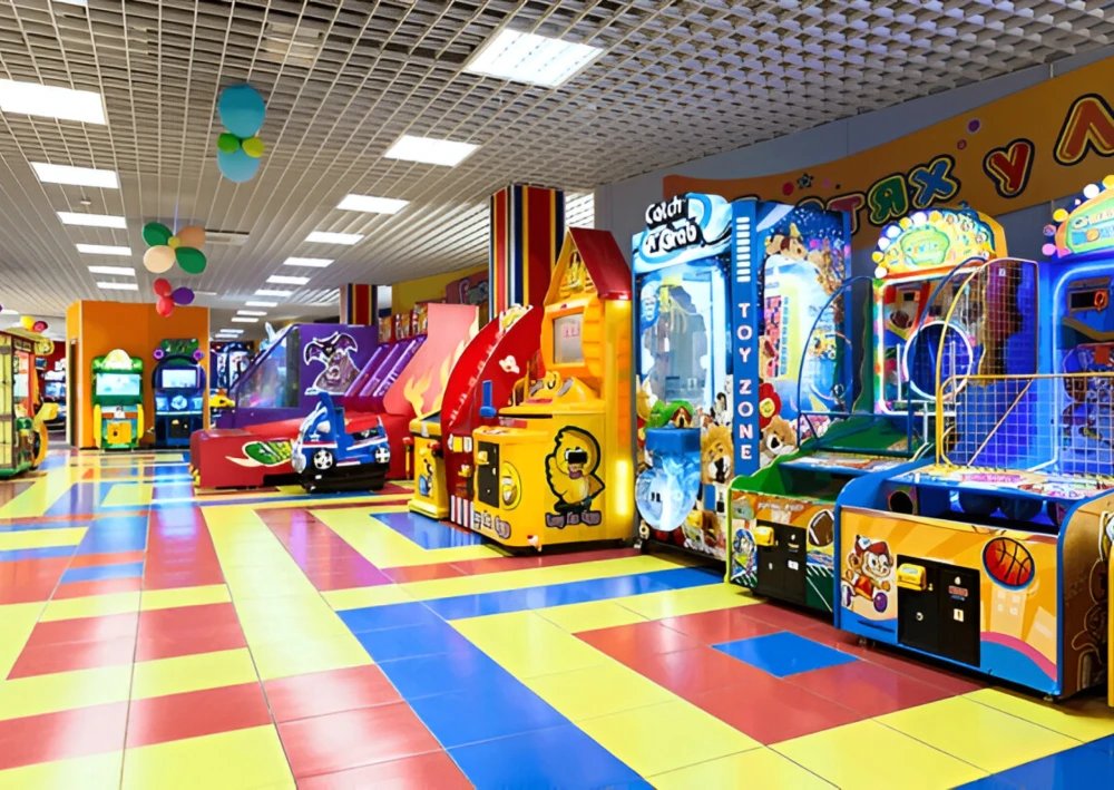 Vibrant gaming zone in Greater Noida featuring arcade machines, kids’ play area, and modern indoor entertainment at a commercial project.